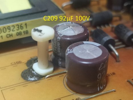 Bild02_Defekter Kondensator C209 92µF 100V.jpg